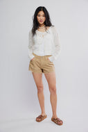 FREE PEOPLE-NOW OR NEVER DENIM SHORTS IN OAT LATTE